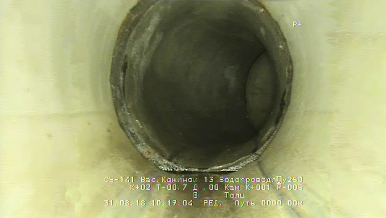 Изображение с камеры телеинспекционного робота, который производит внутритрубную диагностику водопровода.